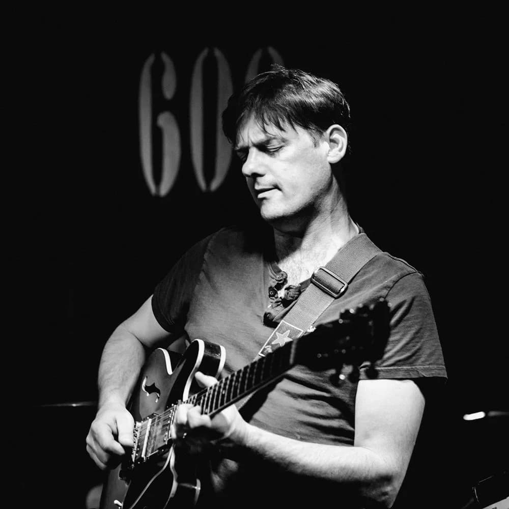 Mike Outram on guitar