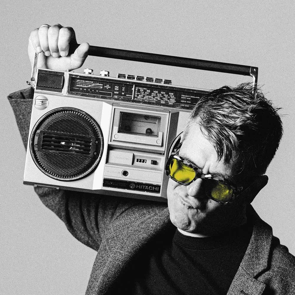 Stefan Redtenbacher holding a boombox