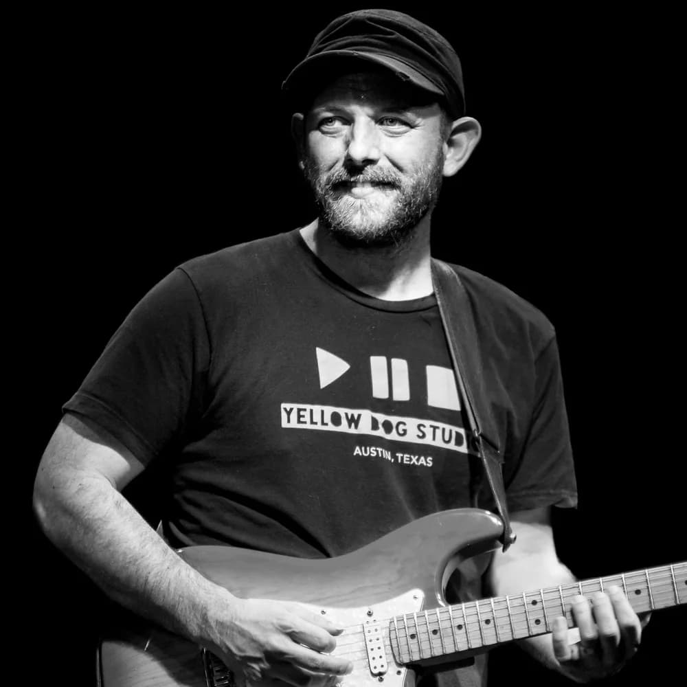 Carter Arrington playing guitar